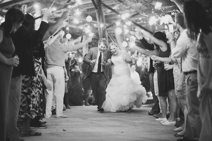 Sean and Kadi Lindsey, the happy couple exit the first garden wedding of 2014.