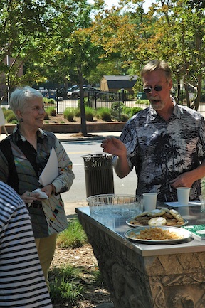 Michael Warrick explains what he believes the Garden adds to the community to a travel writers group organized by George Percy of Geiger and Associates in Tallahassee, Fla.